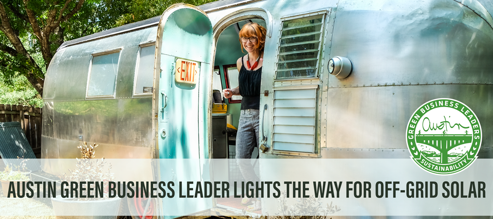 Photo: person looking out of an airstream. She is smiling and has bright red-orange hair. Text reads: Austin Green Business Leader lights the way for off-grid solar