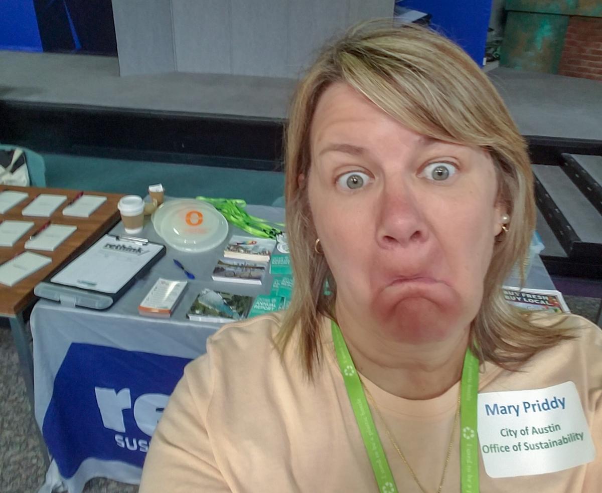 Mary Prddy took a silly selfie in front of an outreach table.