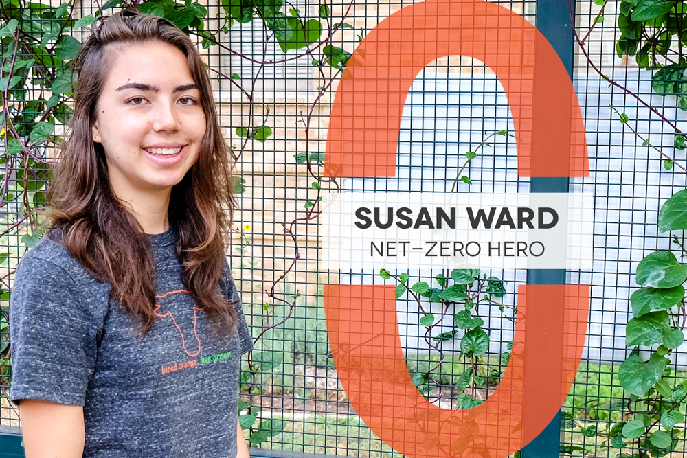 Text: Net-Zero Hero Susan Ward, Photo of Susan standing in front of gate with spinach vines growing behind her.